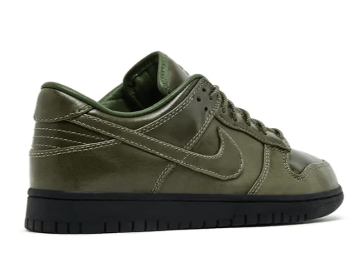 Bottom view of Dunk Low Retro Premium QS Army Olive sneakers showing the tread pattern and Nike branding.